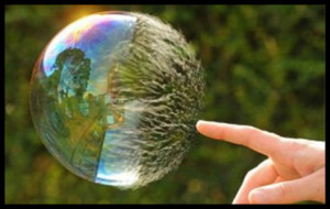 Finger touching bubble showing how to transform Beliefs Instantly
