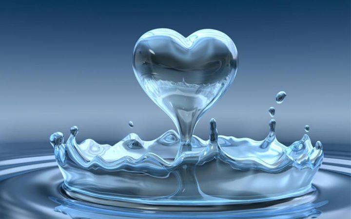 Water splashing to form a heart representing unconditional love.