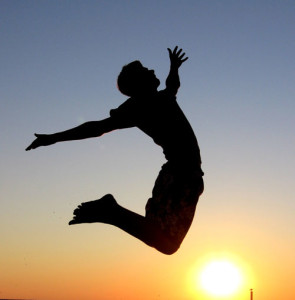 man jumping for joy showing that following our excitement shows us the path