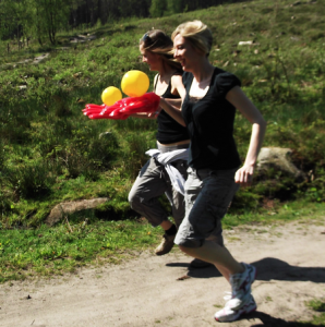 Women running and smiling demostrating that challenges are Exciting