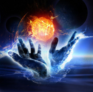 Hands creating new firey Earth demostrating that New Definitions Are Needed To Create a New World