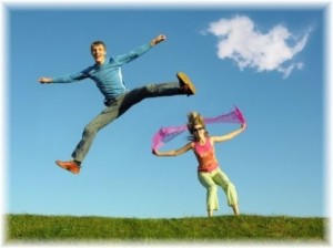 Man and woman jumping and taking action