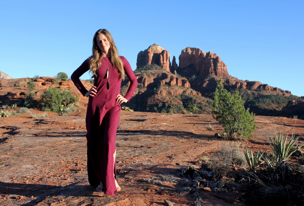 Girl in long red dress in nature in Sedona