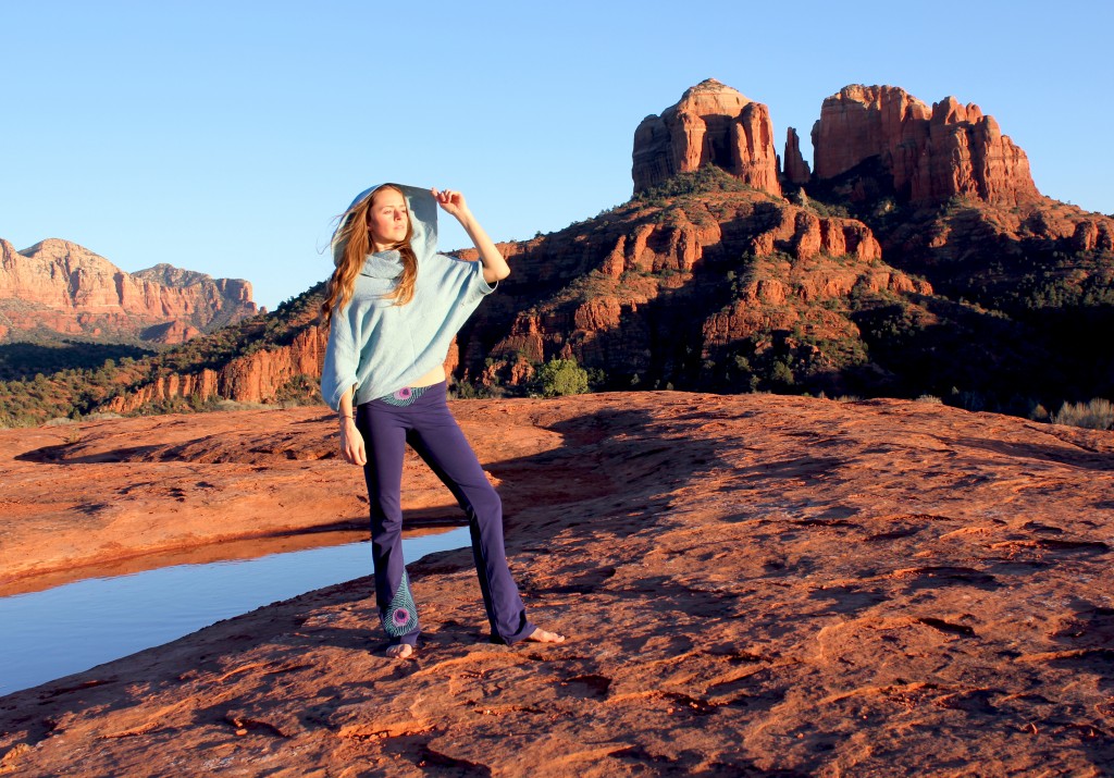 Girl in yoga clothes on the red rocks in Sedona