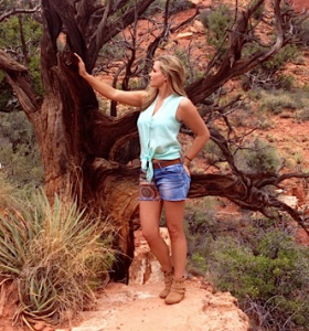 Sandra-Standing-Red-Rocks